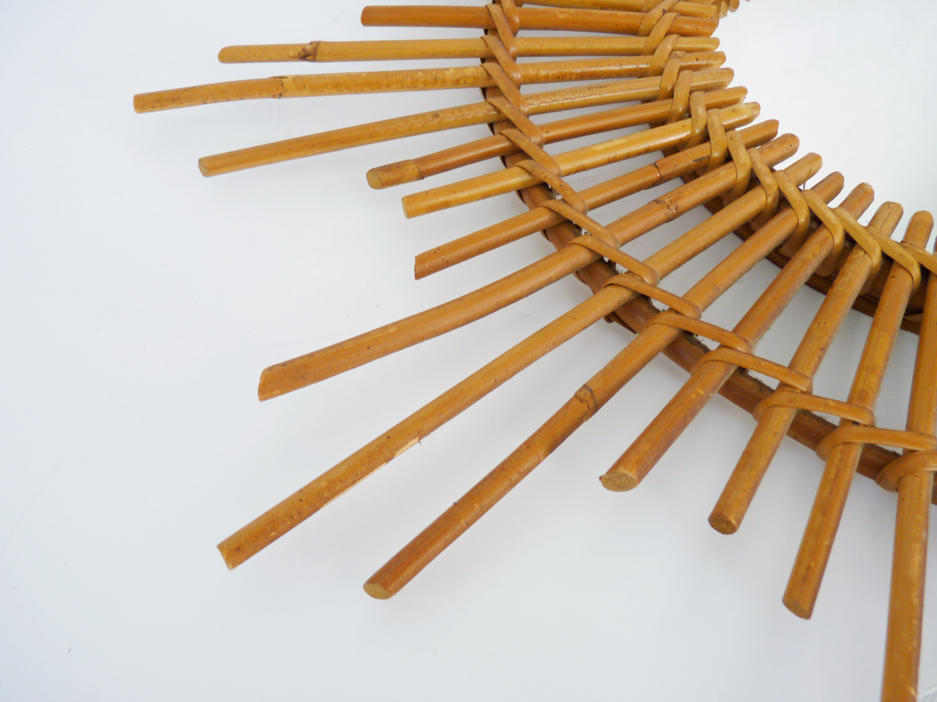 Vintage rattan sun mirror. Year 60
