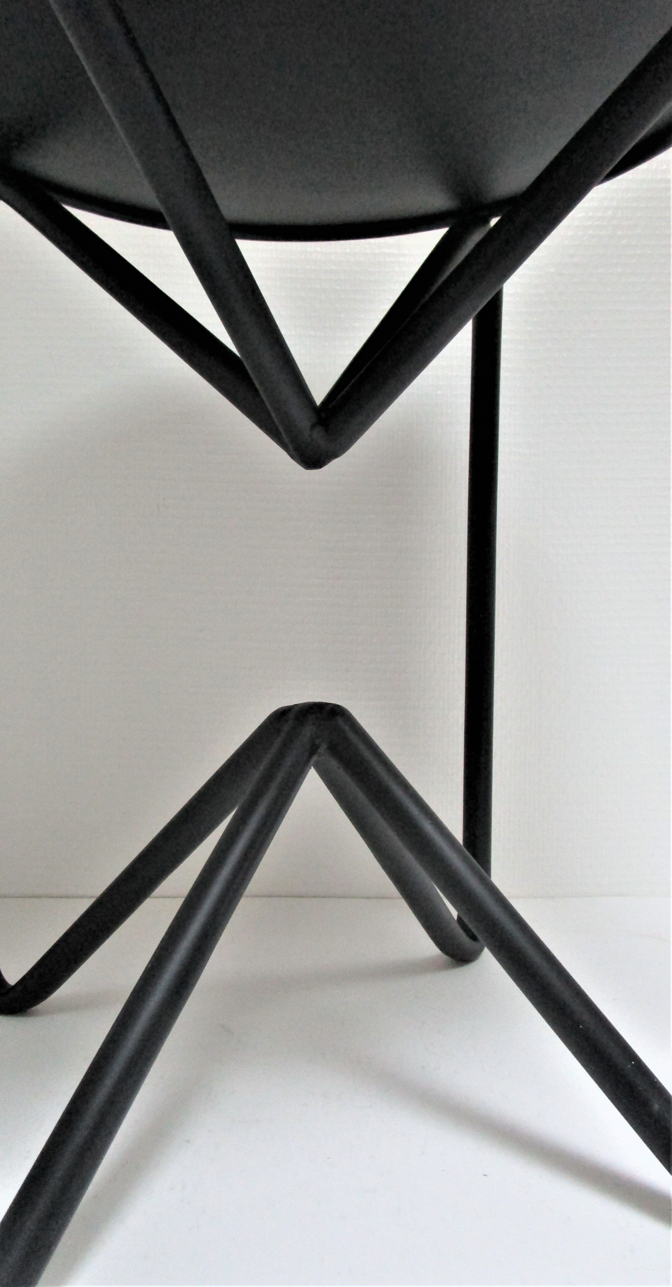 Yellow and black metal stool design 90s
