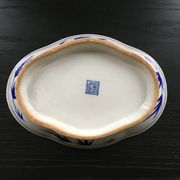 Chinese cup decorated with blue bamboo.