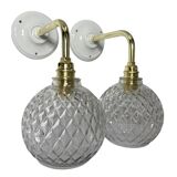Pair of chiseled glass globe wall sconces