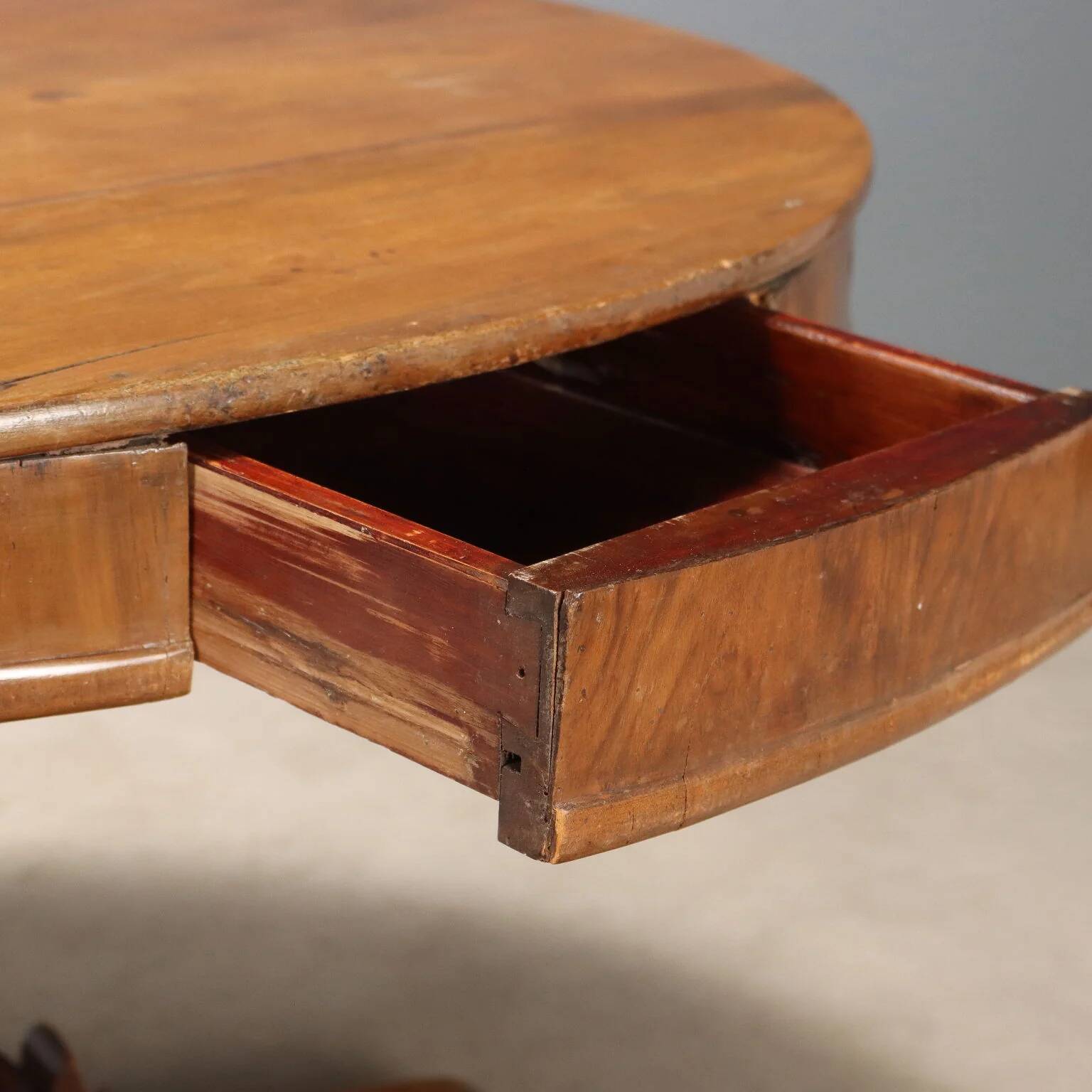 Antique walnut round table with drawers, Italy, 19th century
