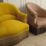 Set of 2 yellow and pink velvet tub chairs.