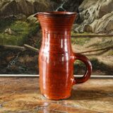 Signed orange ceramic candle holder and jug