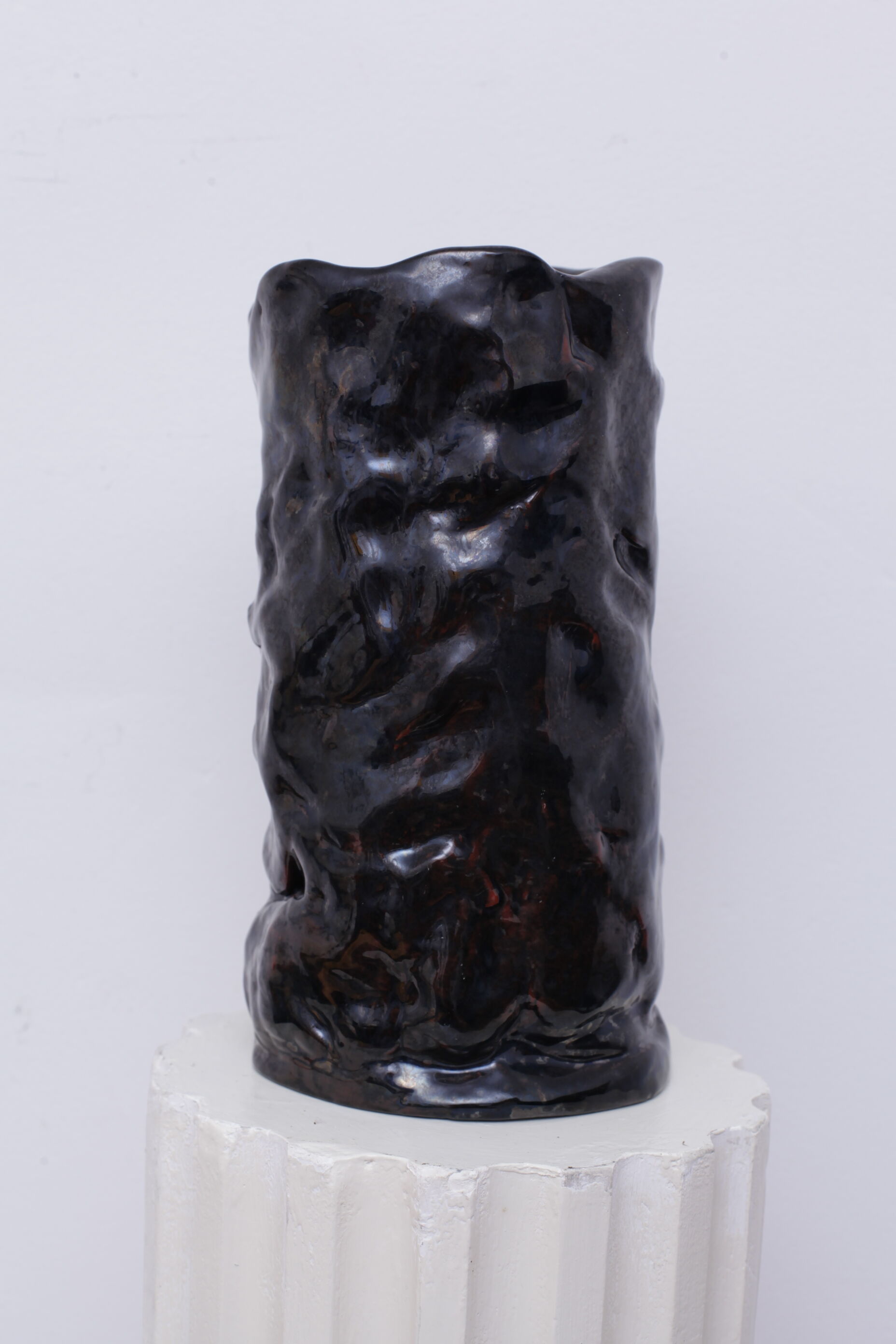 Thick black ceramic vase