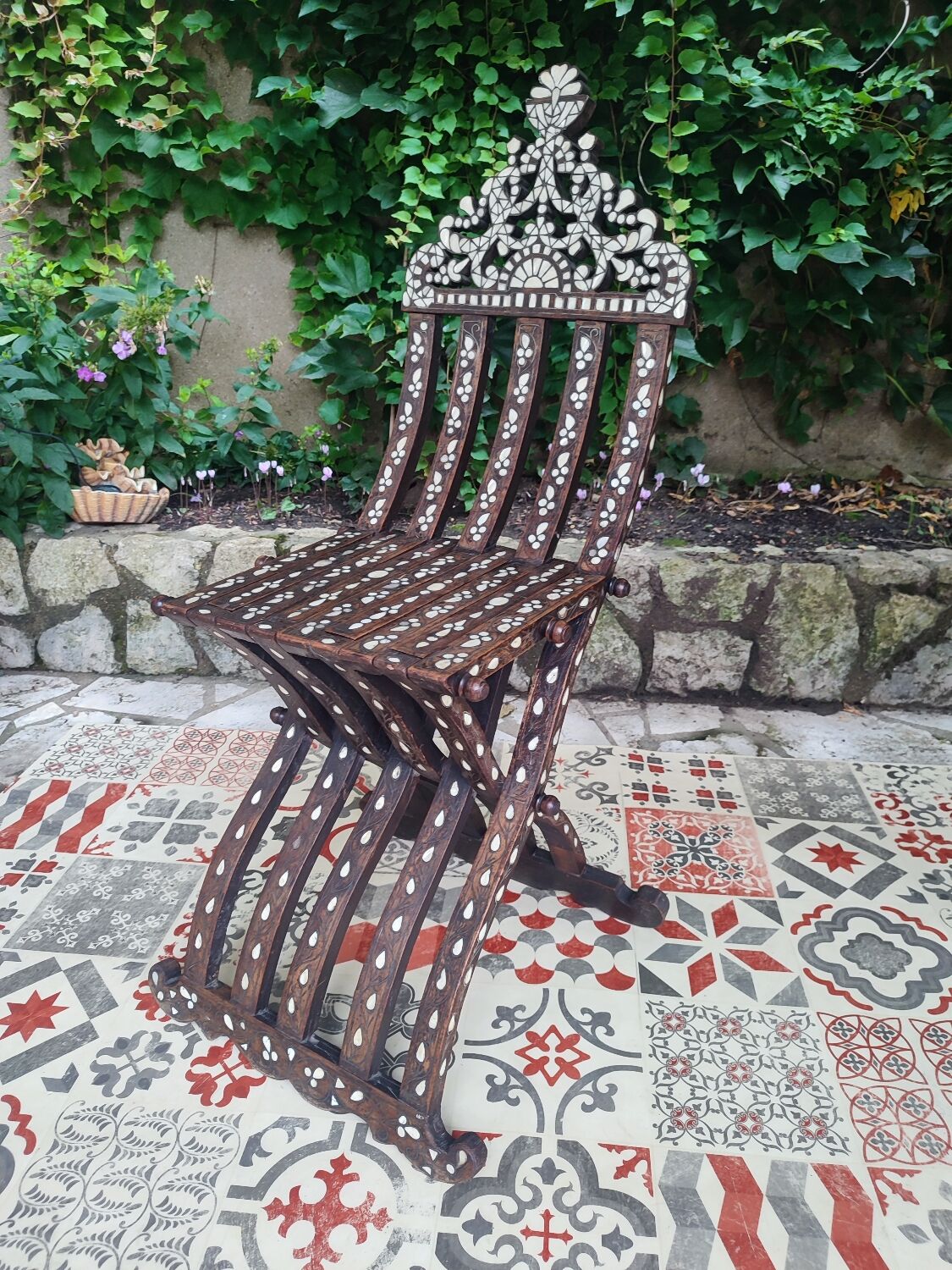Antique folding oriental chair with mother-of-pearl inlays