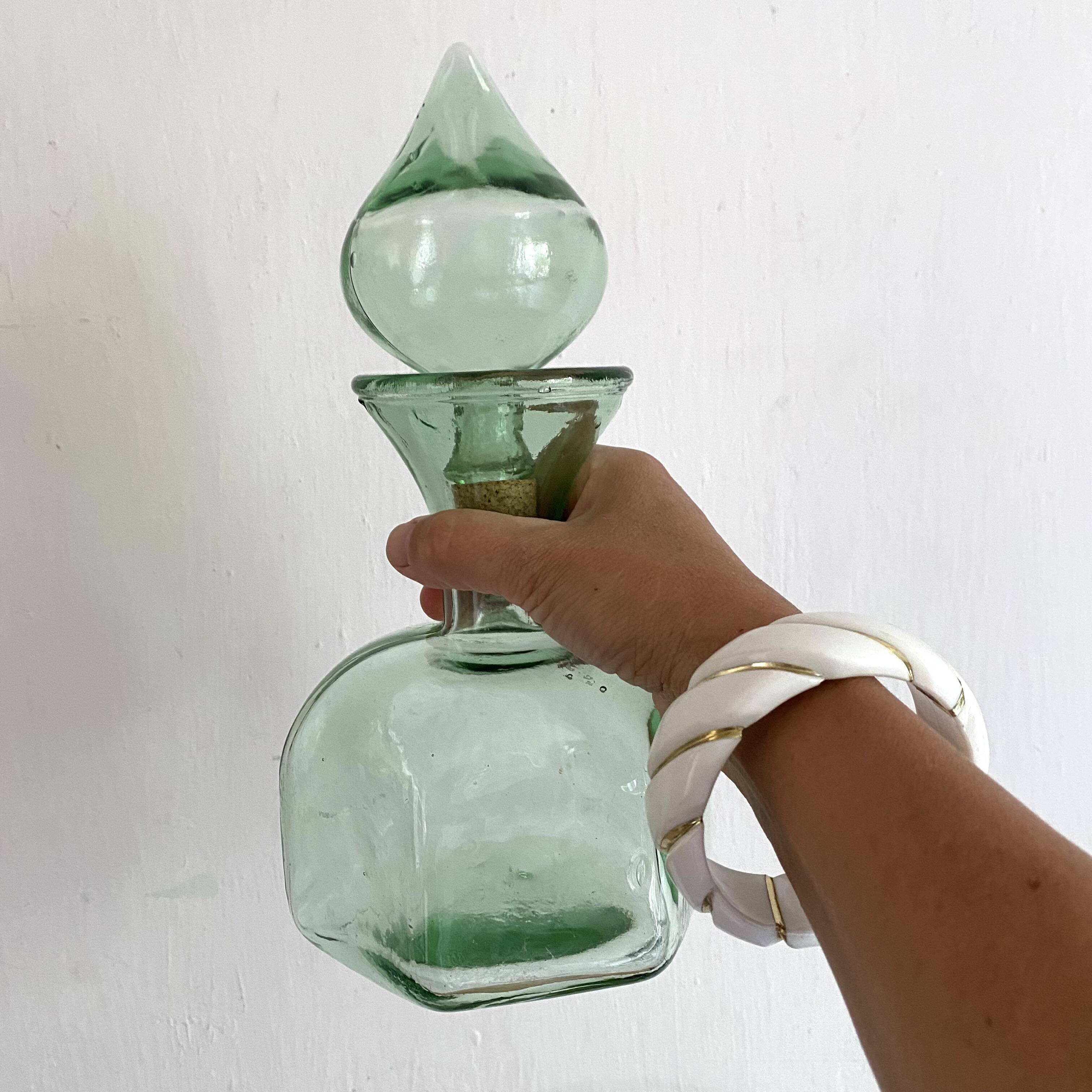 Vintage carafe in light green glass