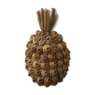 Trash in the form of the pineapple in natural fibers