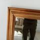 Miroir doré vintage à glace biseautée