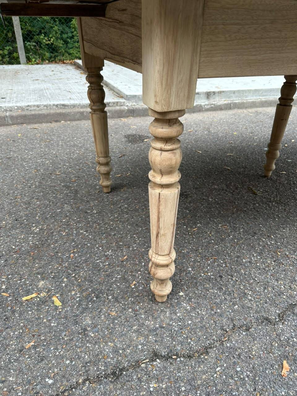 Round extendable dining table with flaps, stripped in raw oak, with 4 extensions.