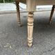 Round extendable dining table with flaps, stripped in raw oak, with 4 extensions.
