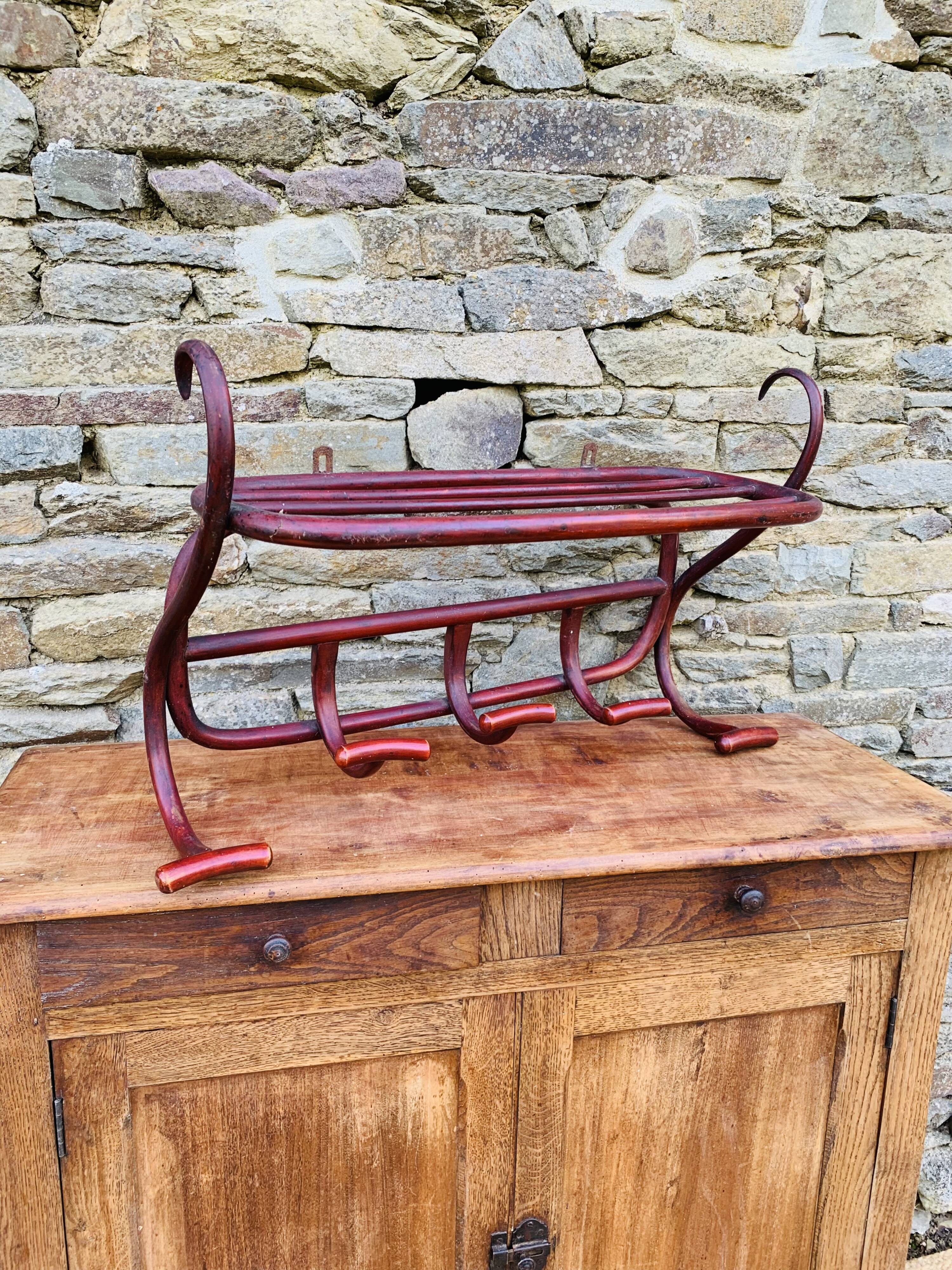 Antique curved wooden wall coat rack