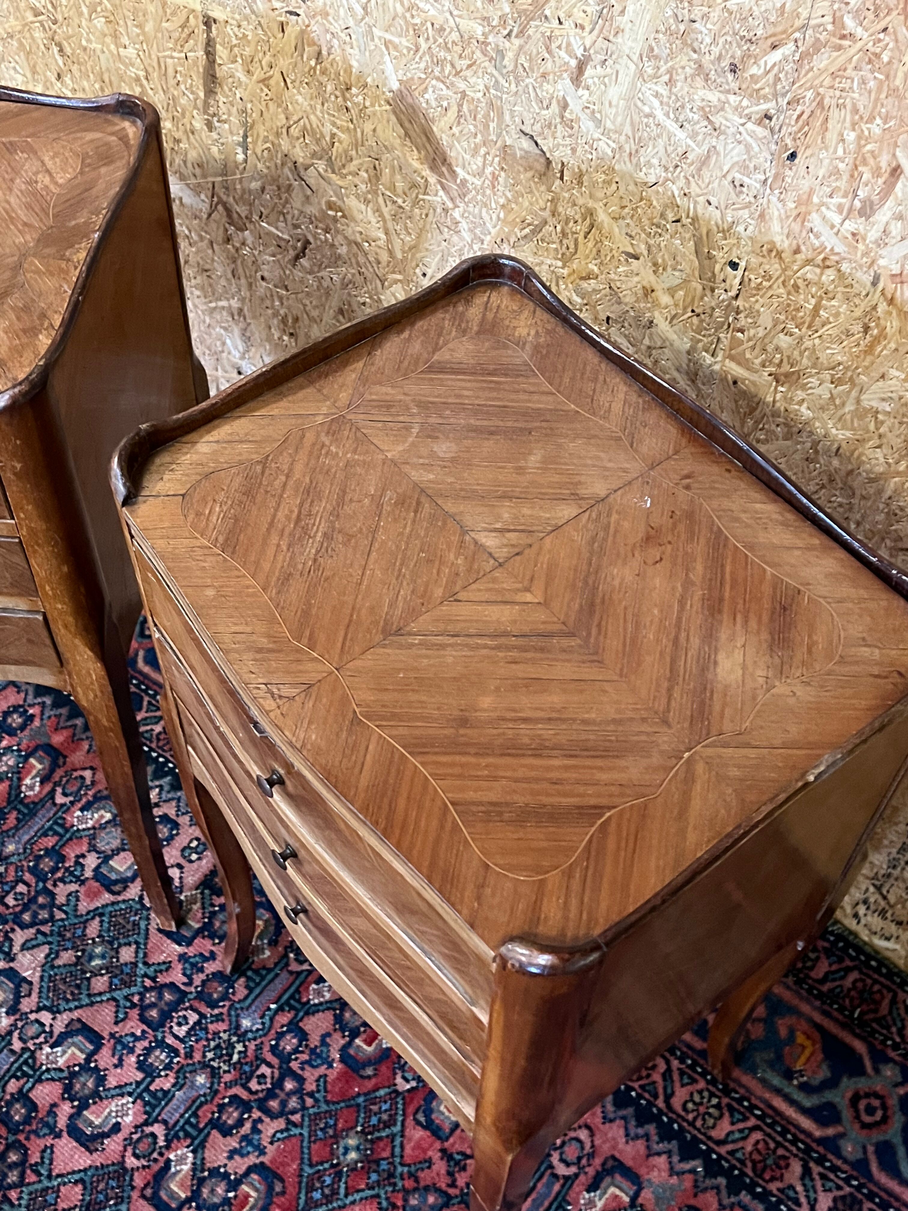 Pair of old Louis XV style bedside tables, in walnut veneer