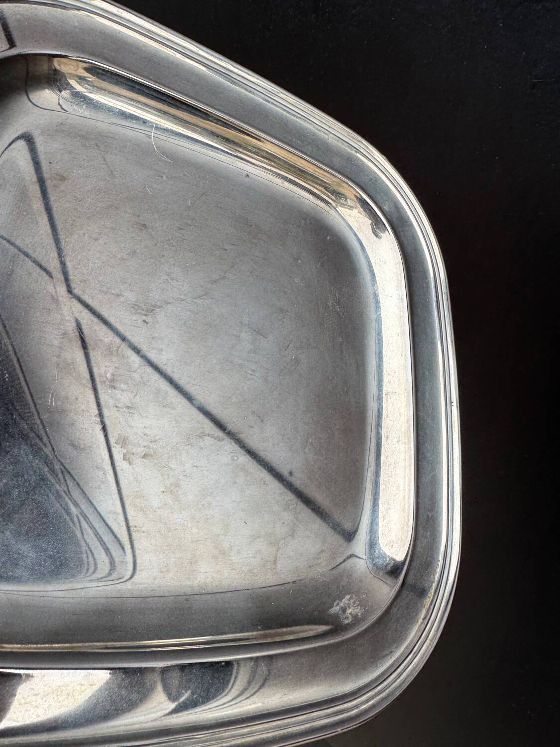 Silver-plated metal underplates from the 1980s.
