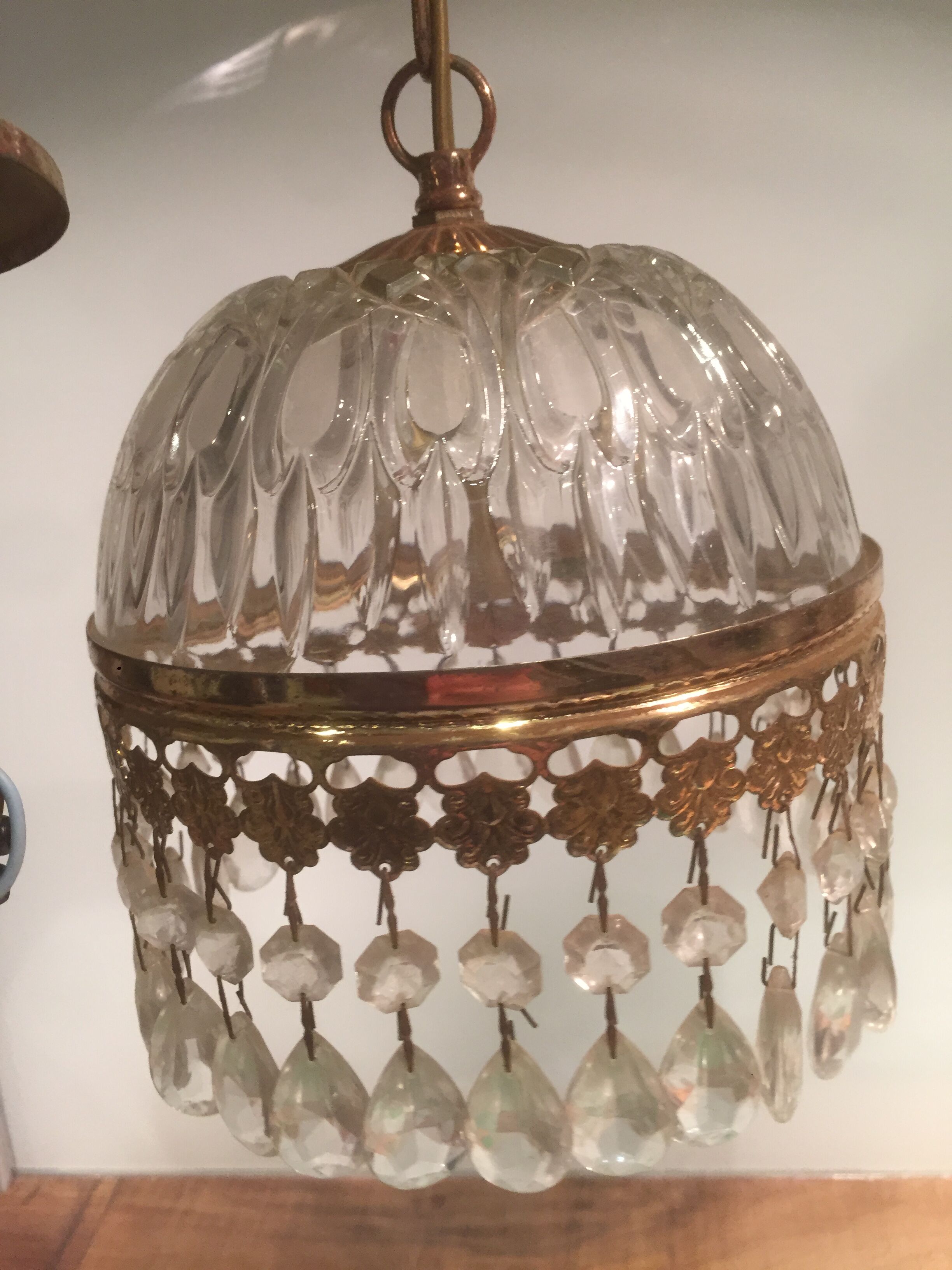 Hanging glass and stamps