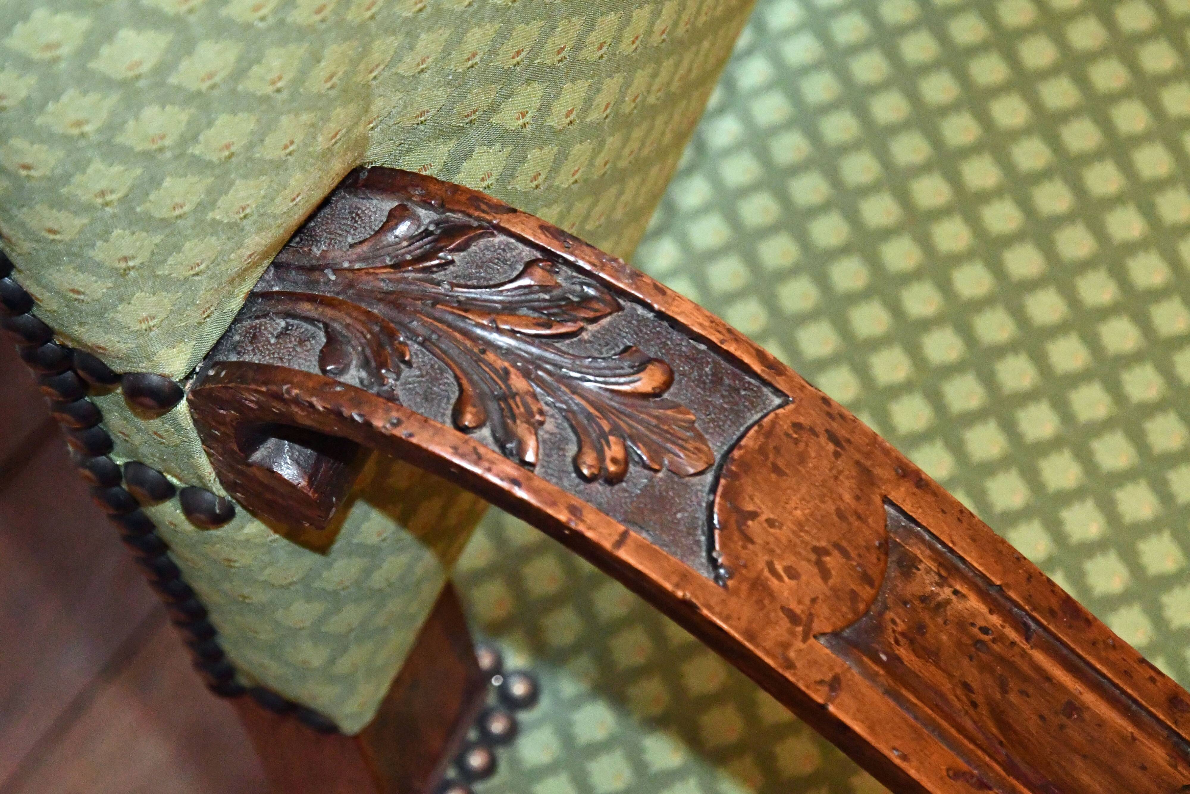 Pair of 17th century ecclesiastical armchairs, Italy, in walnut