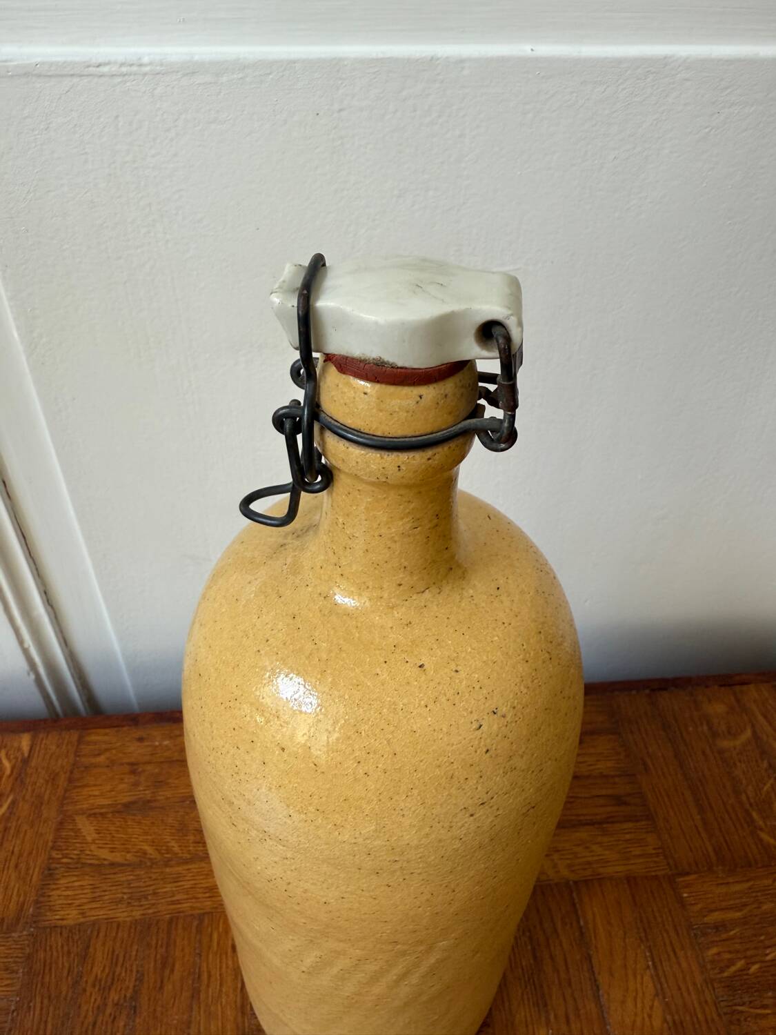Vintage yellow stoneware bottle
