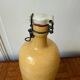 Vintage yellow stoneware bottle