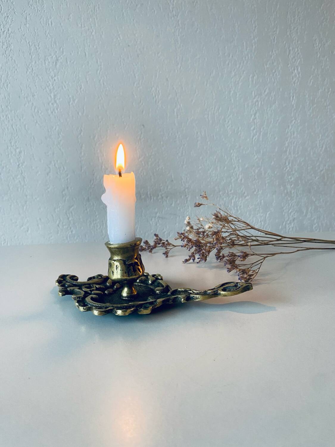 Antique bronze candle holder