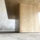 Light beige travertine Italian minimalist coffee table, solid natural stone 1980s