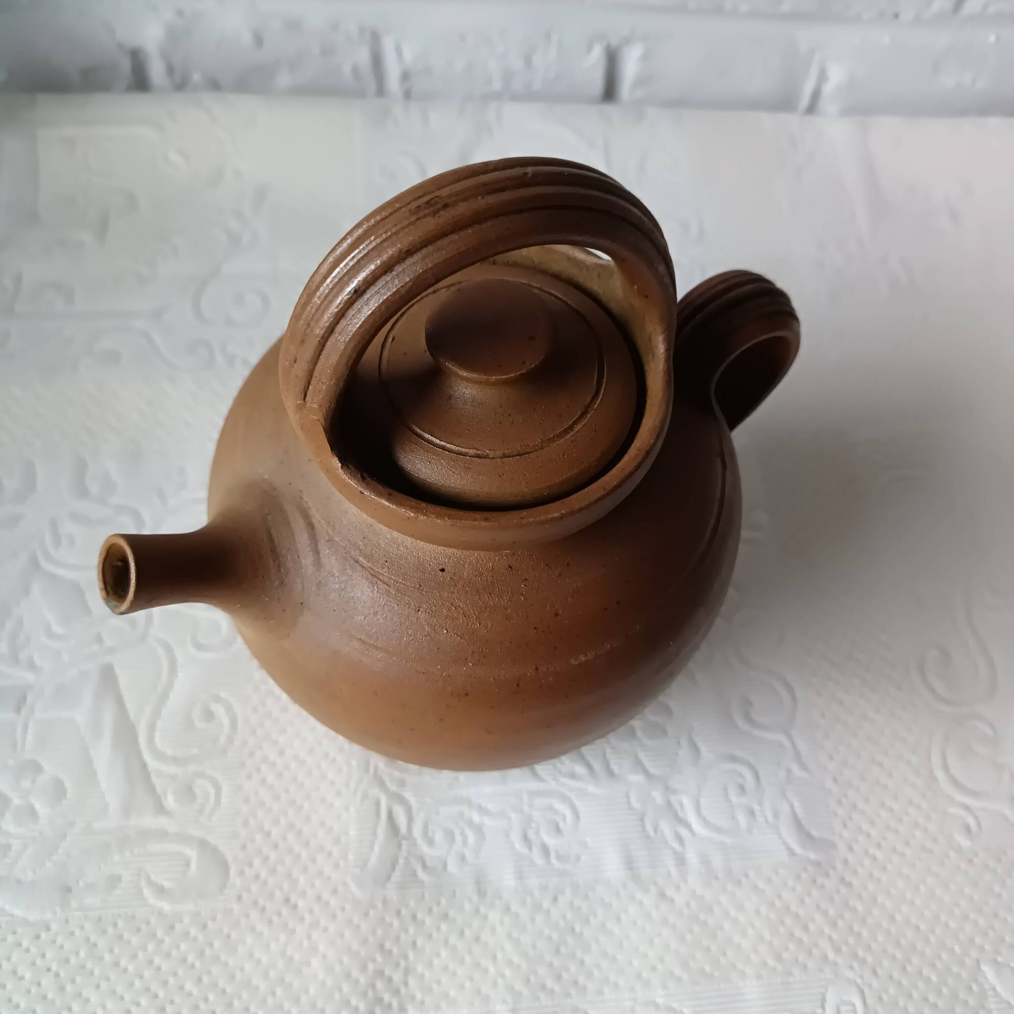 Vintage handmade brown glazed stoneware gargoulette.