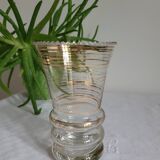 Flared glass vase with gold trim