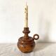 Wooden thumb candle holder