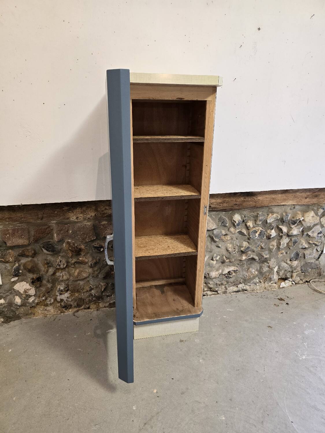Small Mado 1960 kitchen column unit in yellow formica restyled in blue