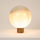 Lampe boule en verre opalescent et bronze patiné.  Contemporain.