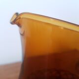 Brown glass decanter/pitcher with 70s wicker basket