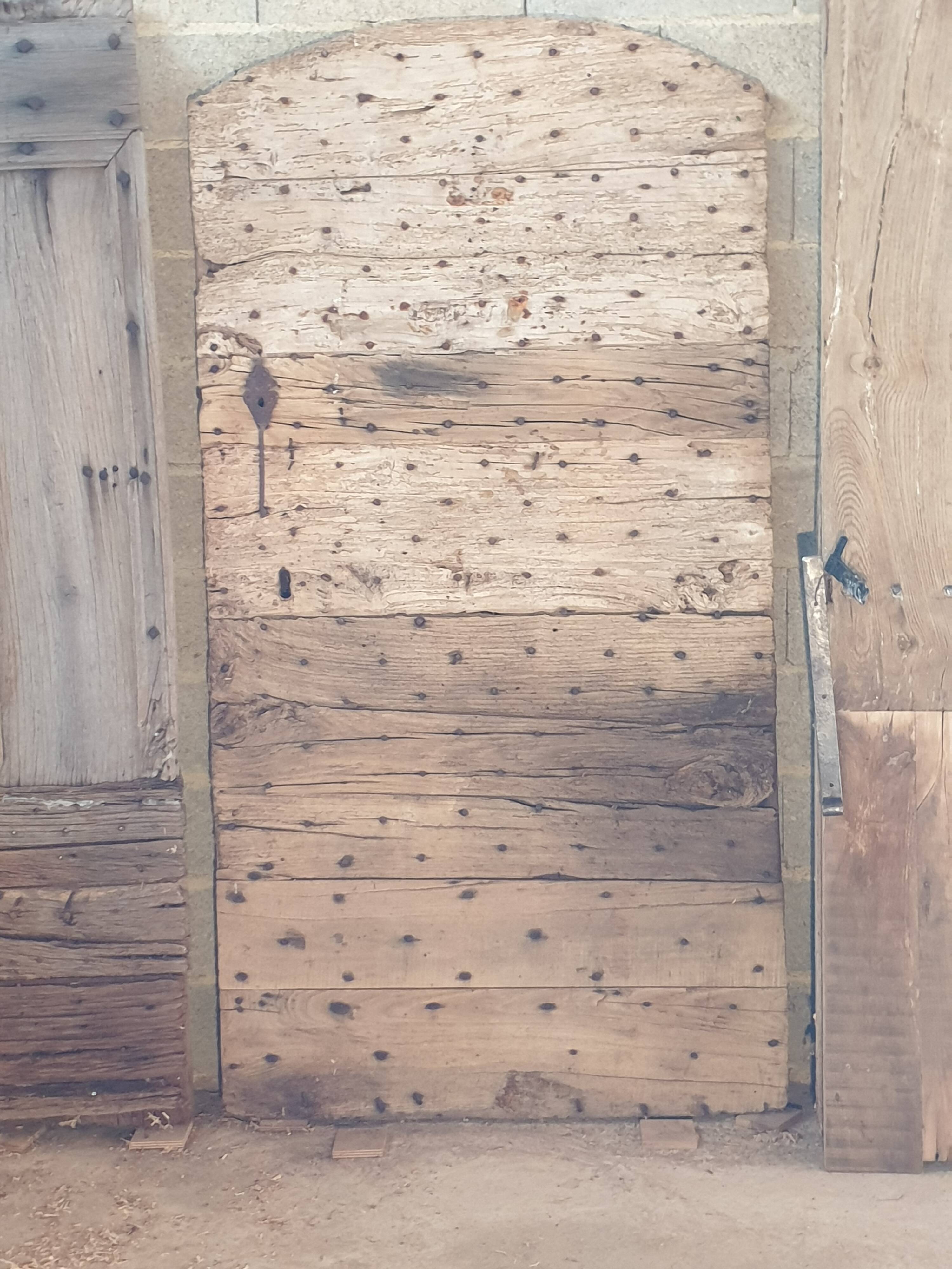 18th century studded chestnut door