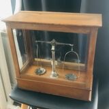 Apothecary trebuchet scale in wooden chest