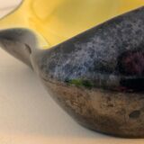 Yellow and black ceramic ashtray