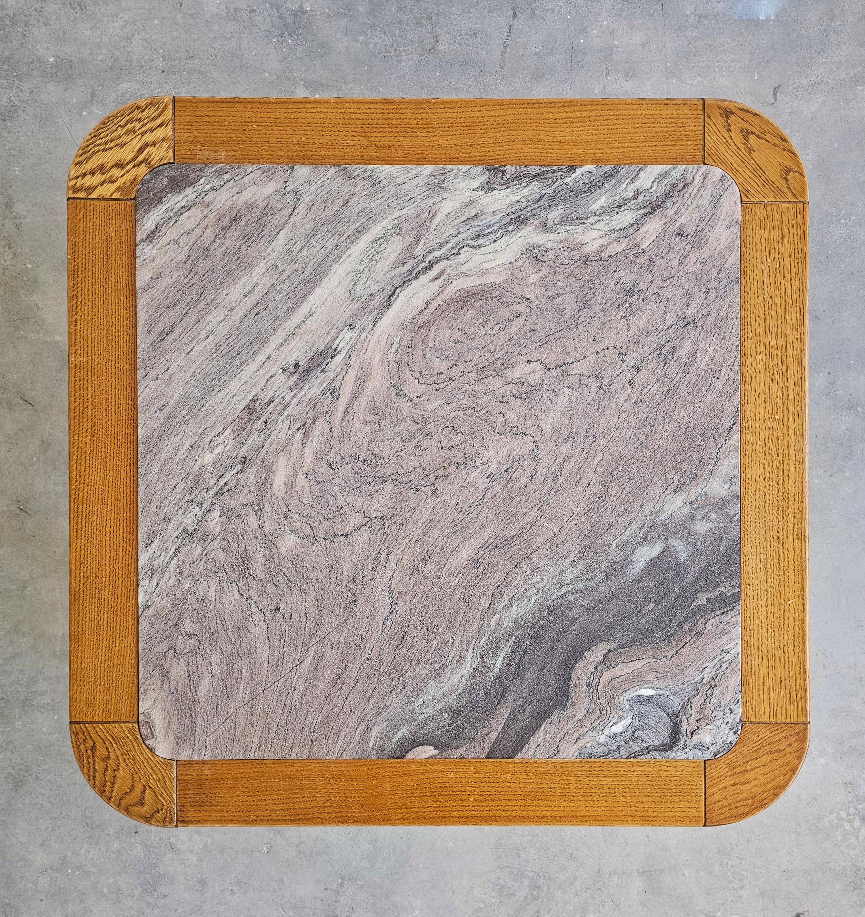 Brutalist coffee table in solid oak with a Rosso Luana marble top.