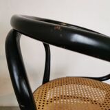 Curved wood and cane armchair called "Le Corbusier"