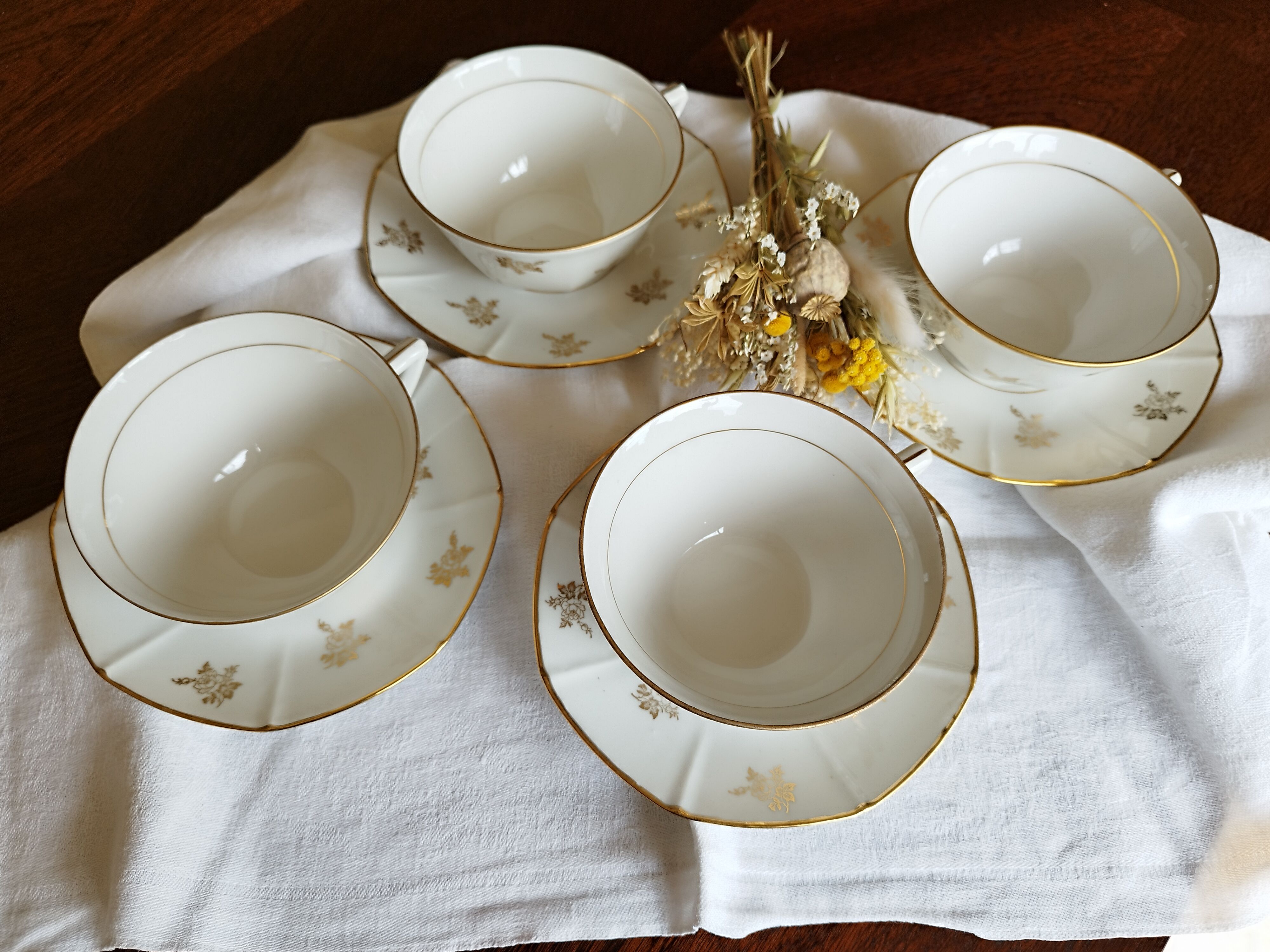 Set of 4 white porcelain cups