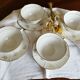 Set of 4 white porcelain cups
