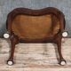 English piano stool in Louis XV style made of mahogany in a bean shape.
