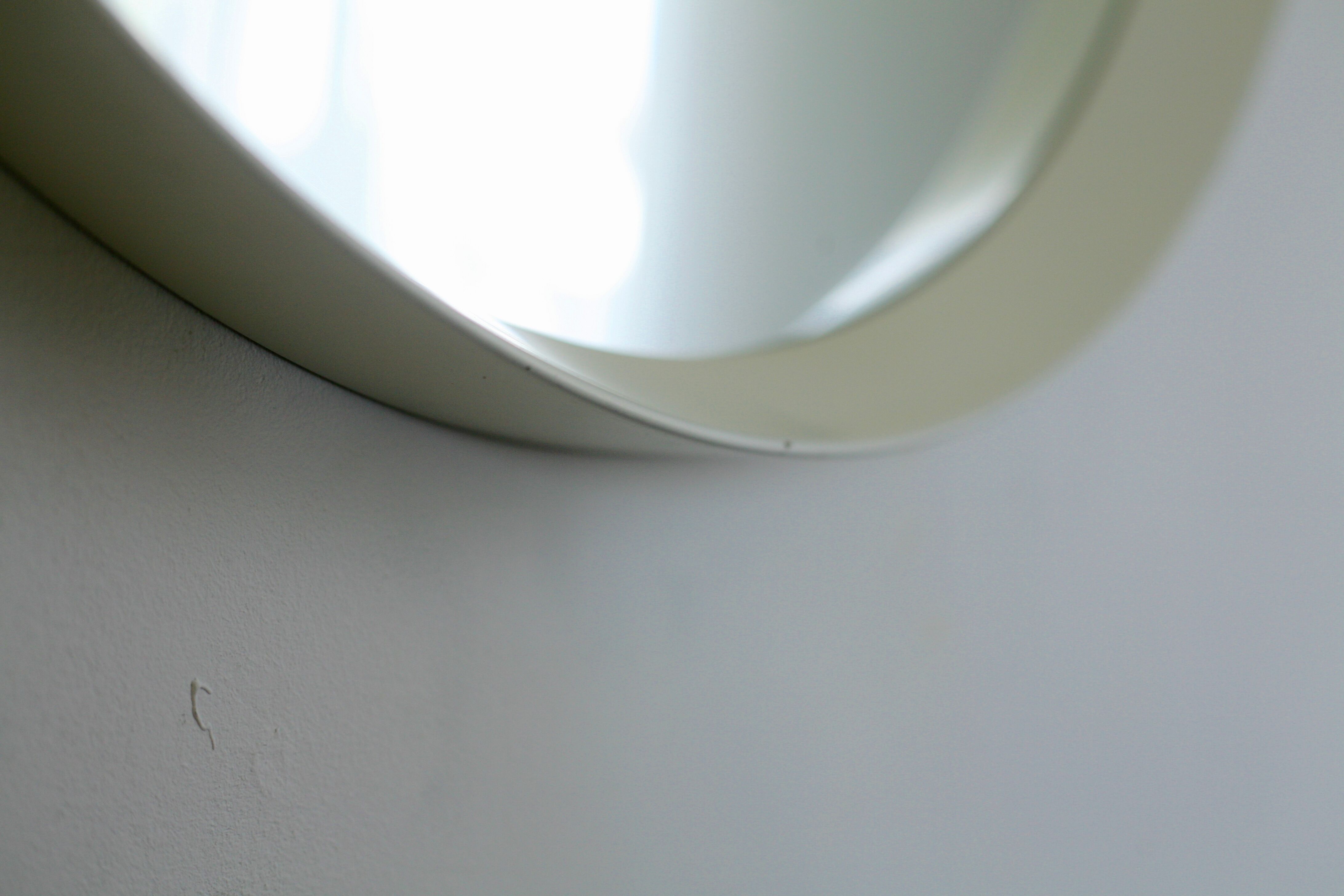 Circular mirror in "cream" laqué wood France circa 1960 68cm