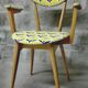 Blonde wooden chair in Scandinavian style from the 1960s.
