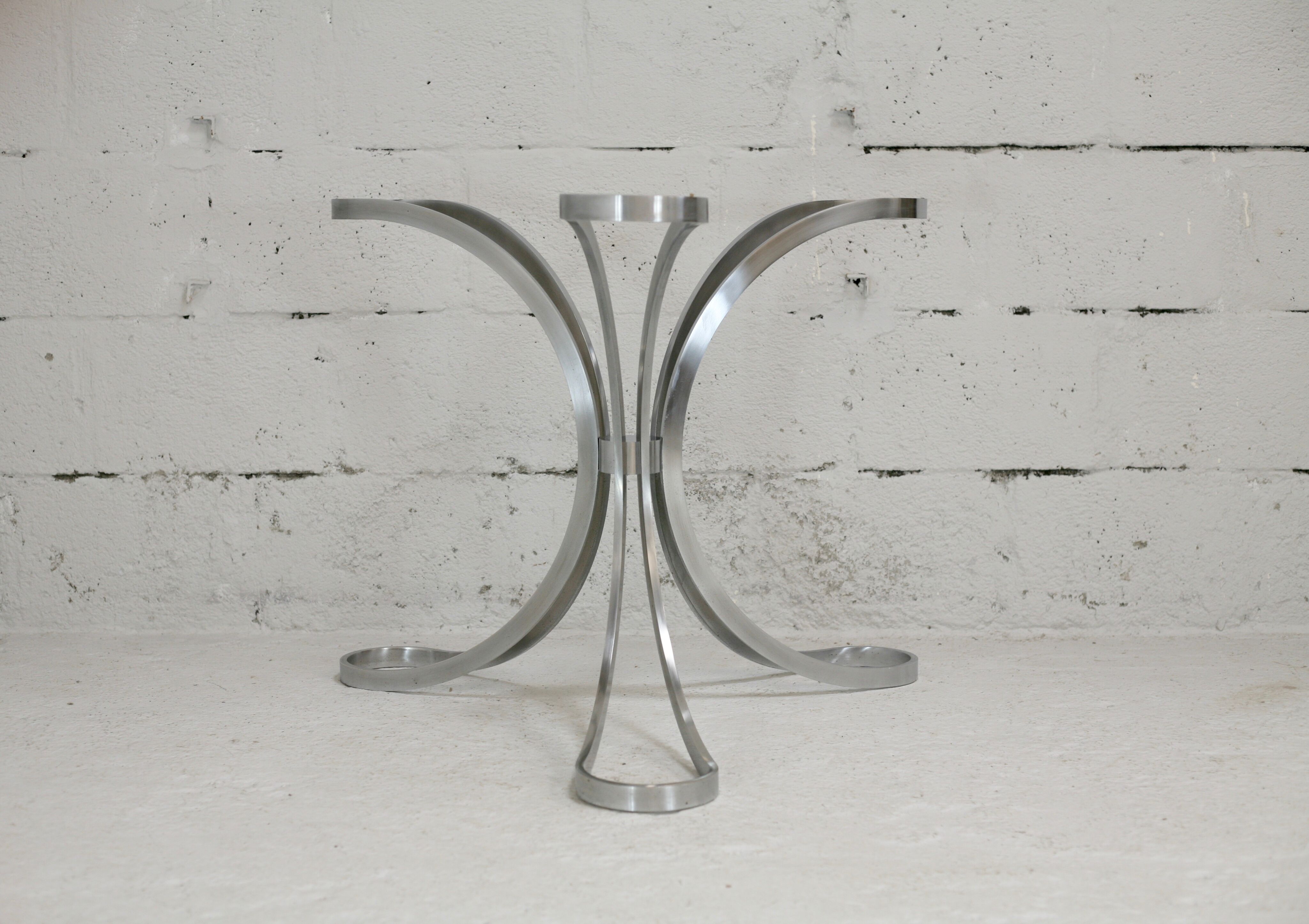 Living room table "Space Age" polished steel, circular slab smoked glass. France, circa 1970.