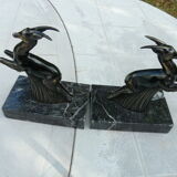 Pair of greenhouse book antelope in regulation on marble base