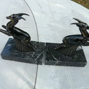 Pair of greenhouse book antelope in regulation on marble base