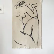 Female painting on unprimed canvas