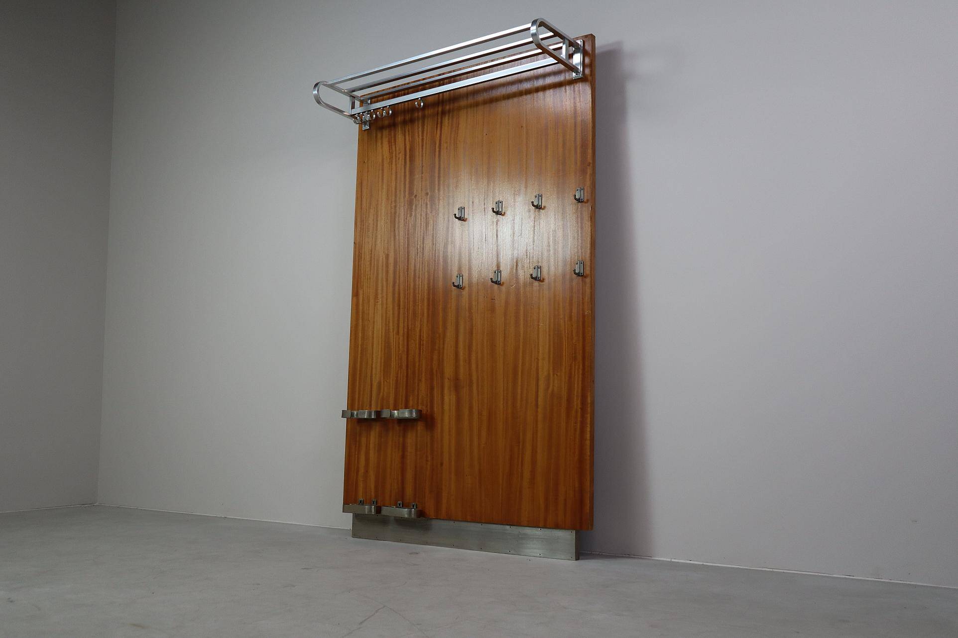Modernist wall-mounted cloakroom in teak