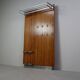 Modernist wall-mounted cloakroom in teak