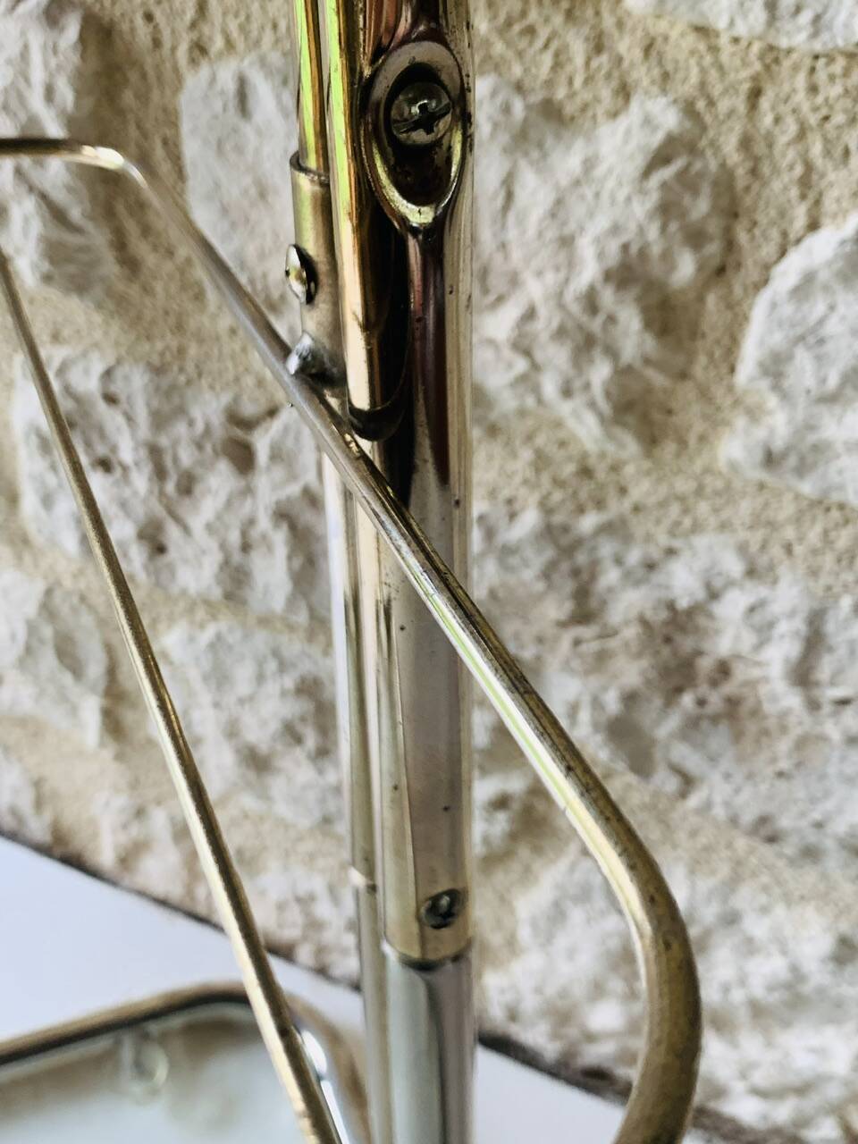 Glass and brass side table with magazine rack, circa 1970's