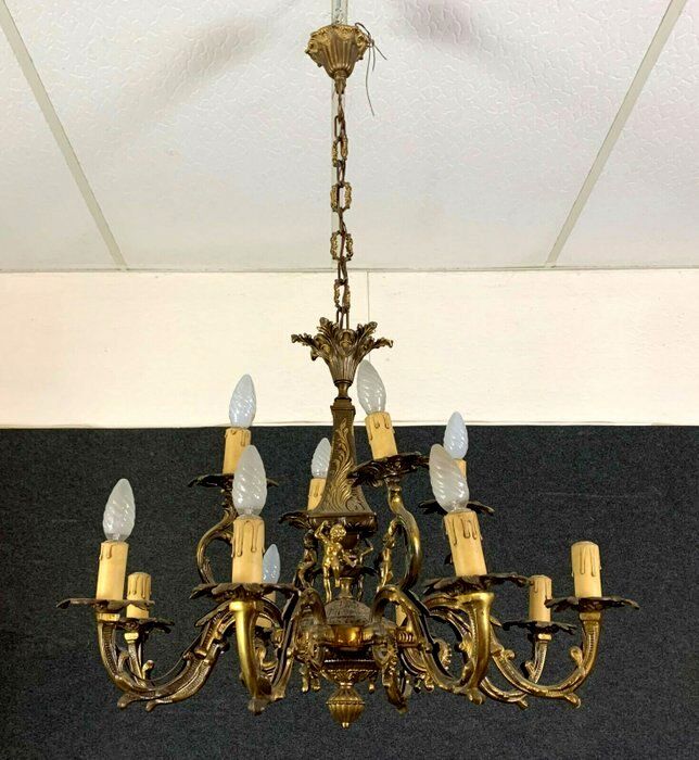 Napoleon III style chandelier in gilded bronze and patinated with putti decorations