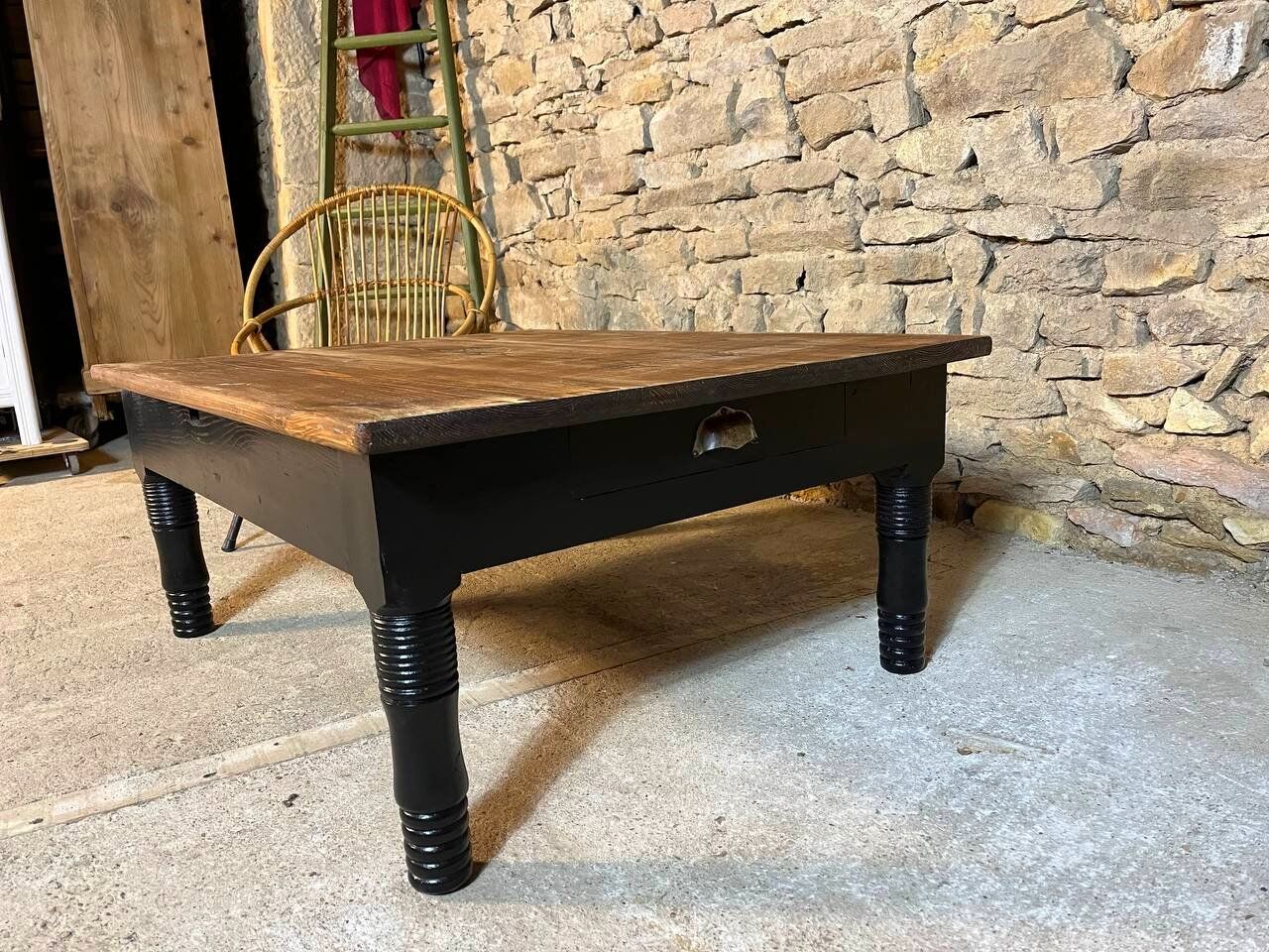 Raw wood coffee table - black legs