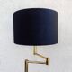 Articulated floor lamp in brass with a velvet shade, 1970.