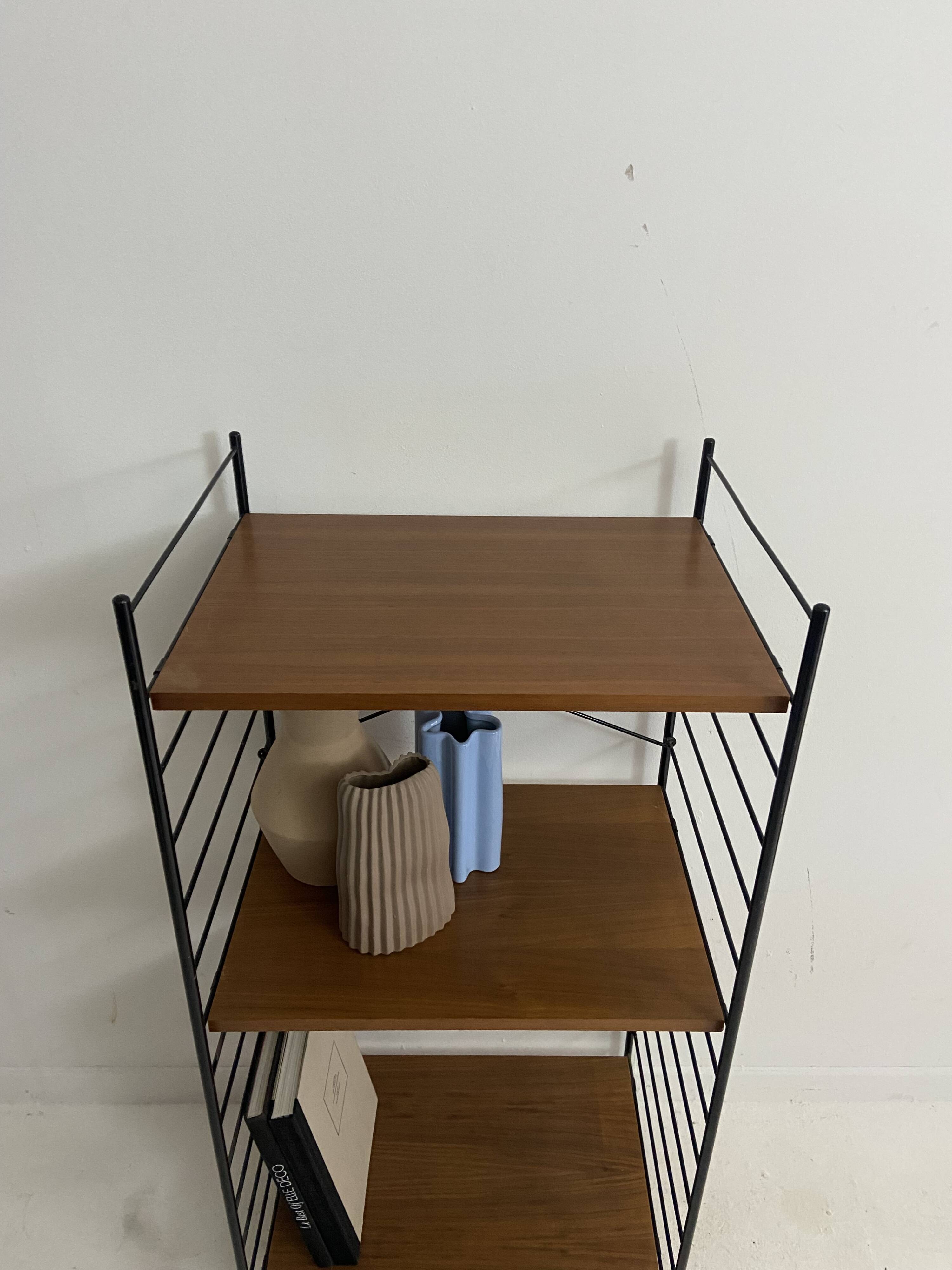 small vintage metal and teak string bookshelf